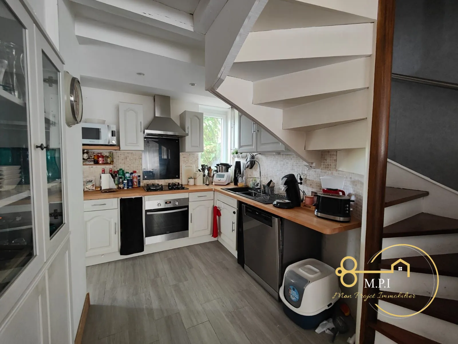 Maison en pierre à vendre près d'Alençon avec garage et terrain clos 