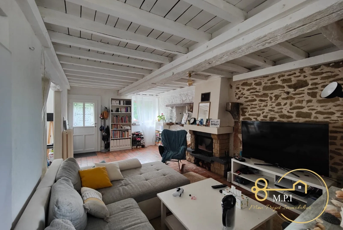 Maison en pierre à vendre près d'Alençon avec garage et terrain clos 
