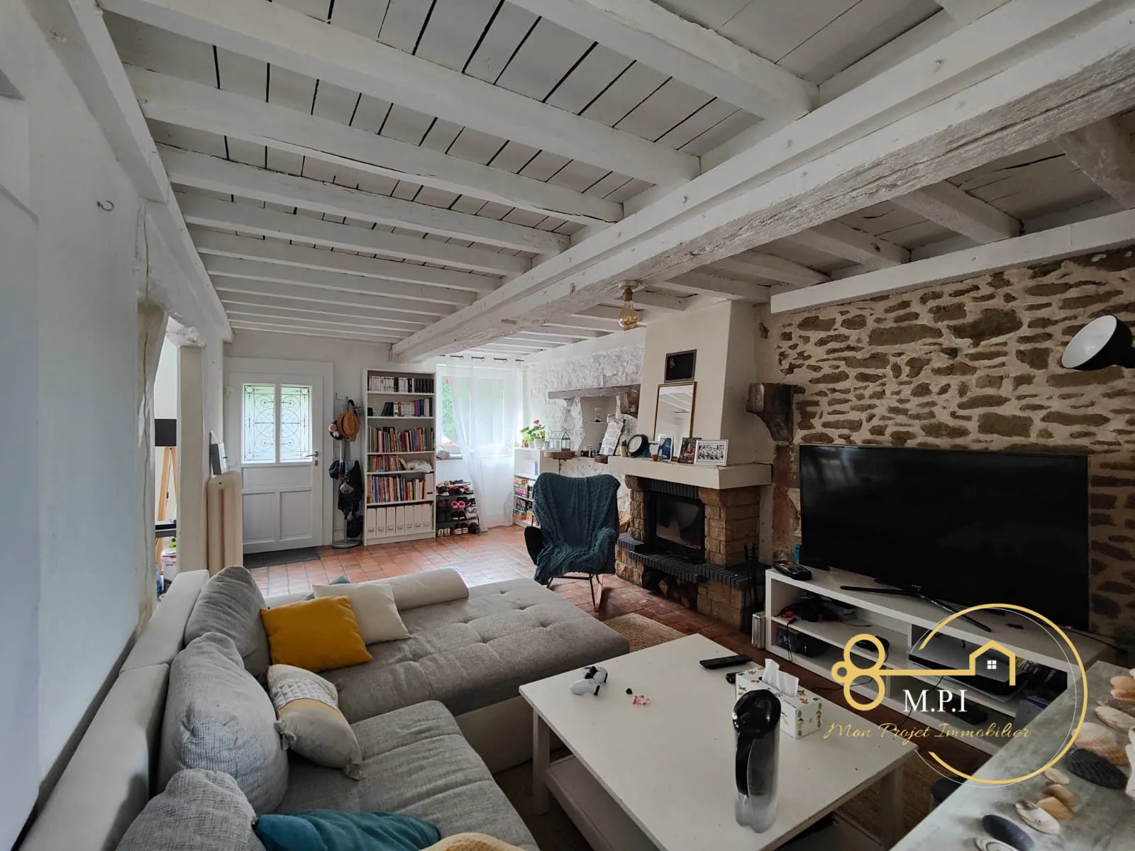 Maison en pierre à vendre près d'Alençon avec garage et terrain clos 