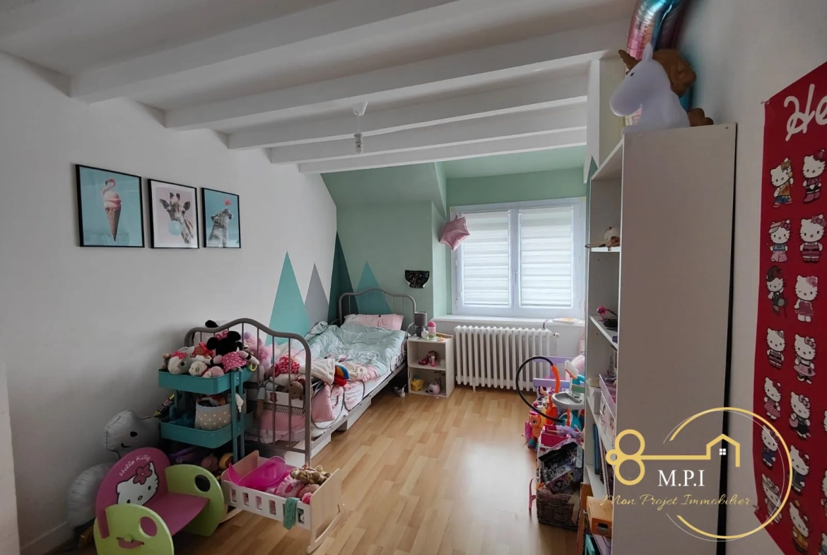 Maison en pierre à vendre près d'Alençon avec garage et terrain clos 