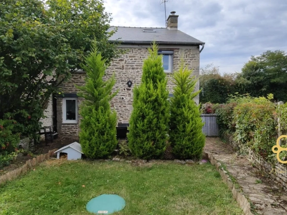 Maison en pierre à vendre près d'Alençon avec garage et terrain clos