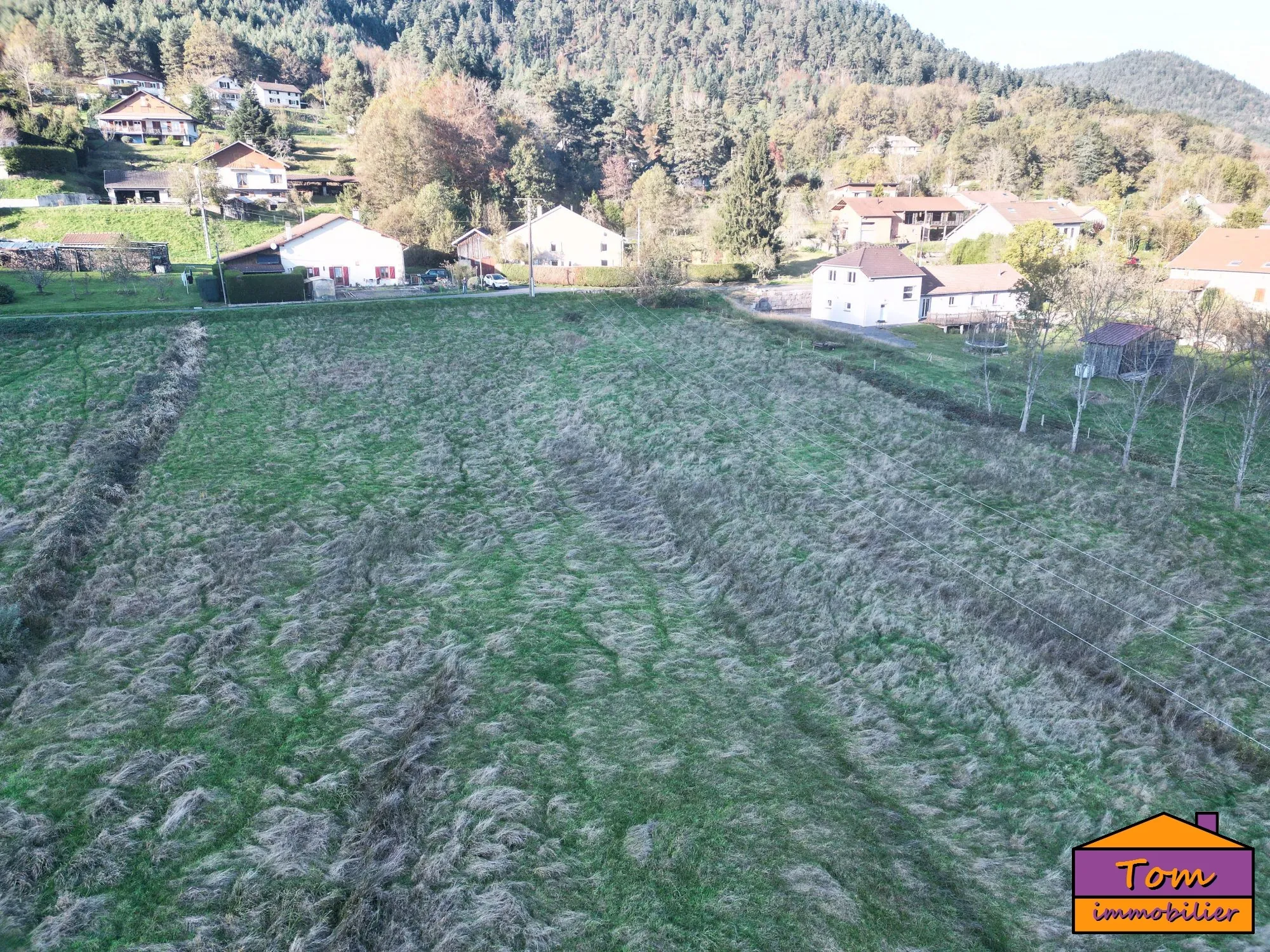 Terrain constructible de 3600 m² à Taintrux avec vue sur les Vosges 