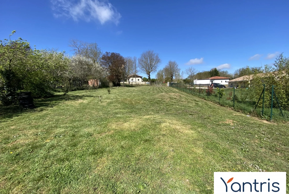 Terrain à bâtir de 1270 m² à Bragayrac, vue tranquille, proximité des écoles et commerces 
