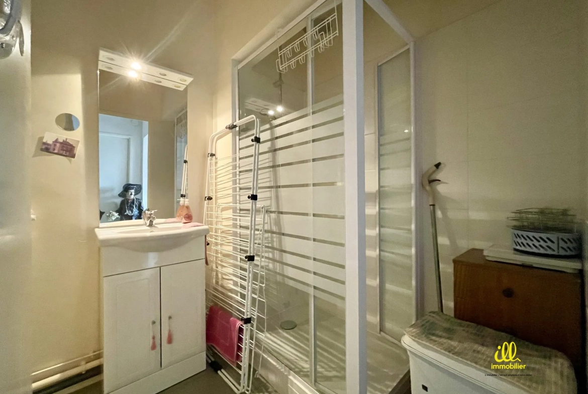 Appartement à vendre à Sedan avec locataire en place, cave et parking 