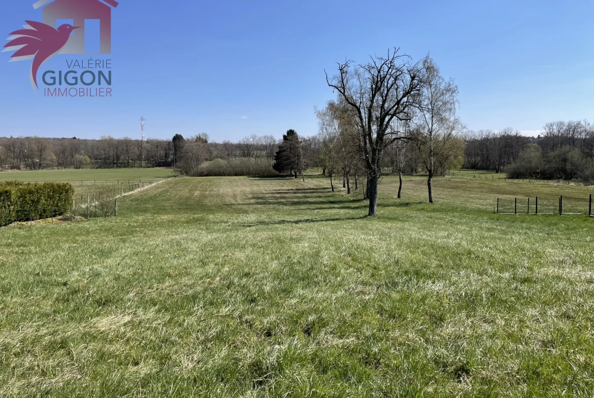 Terrain constructible à Fontaine avec vue dégagée - 13 ares 