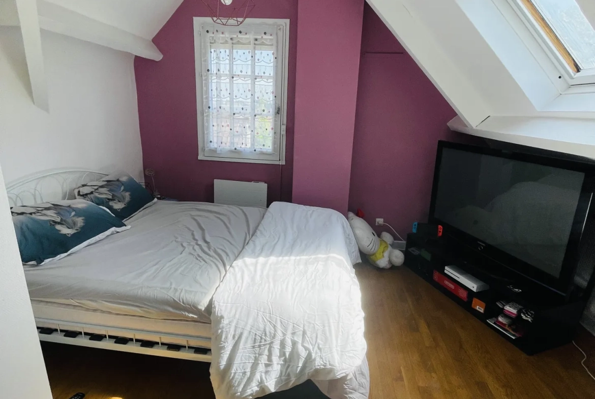 Vente d'une maison familiale à Saint-Quentin avec sous-sol complet et jardin 