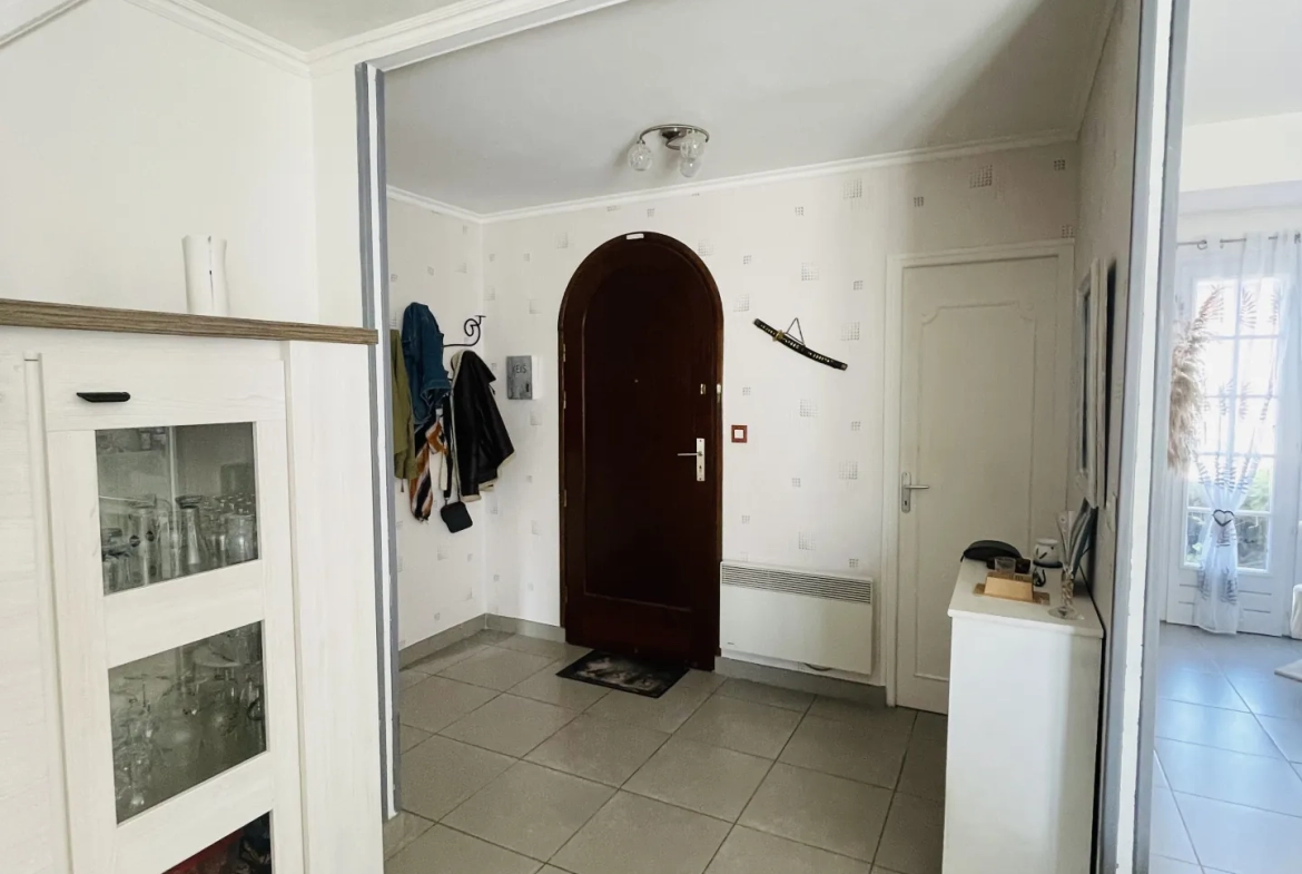 Vente d'une maison familiale à Saint-Quentin avec sous-sol complet et jardin 