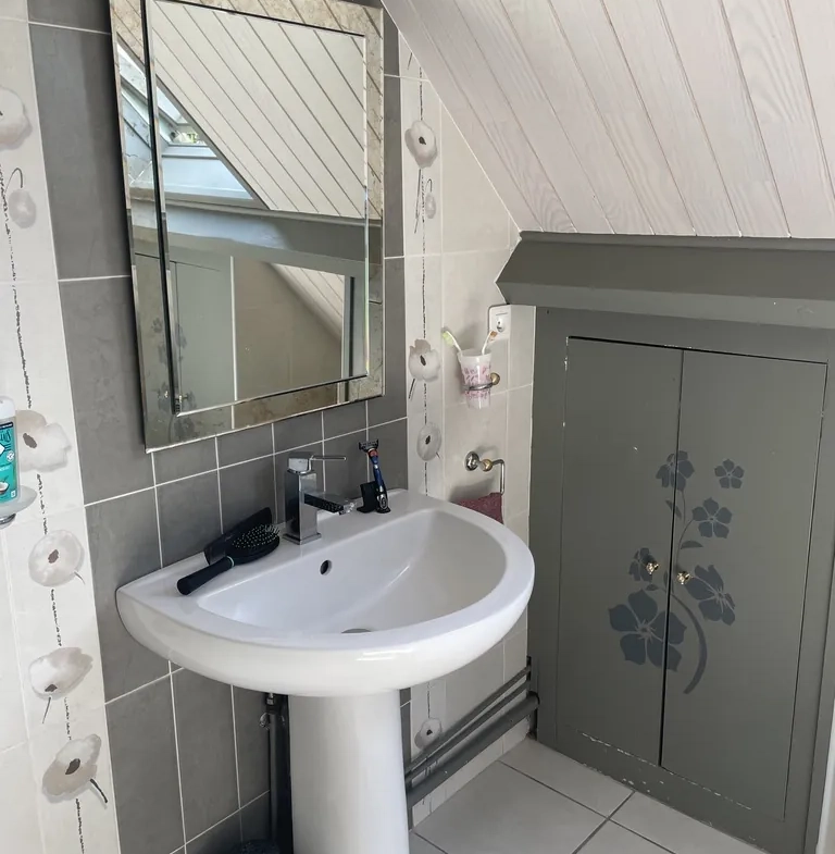 Vente d'une maison familiale à Saint-Quentin avec sous-sol complet et jardin 