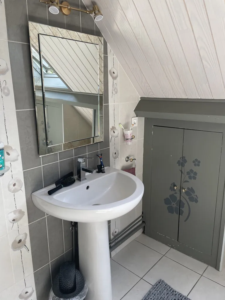 Vente d'une maison familiale à Saint-Quentin avec sous-sol complet et jardin 