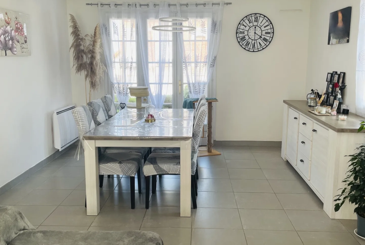 Vente d'une maison familiale à Saint-Quentin avec sous-sol complet et jardin 