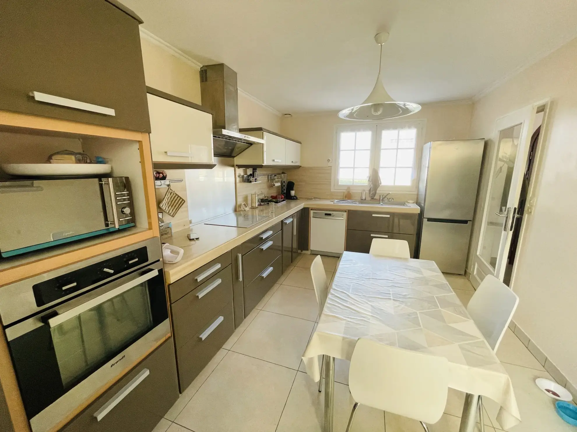 Vente d'une maison familiale à Saint-Quentin avec sous-sol complet et jardin 