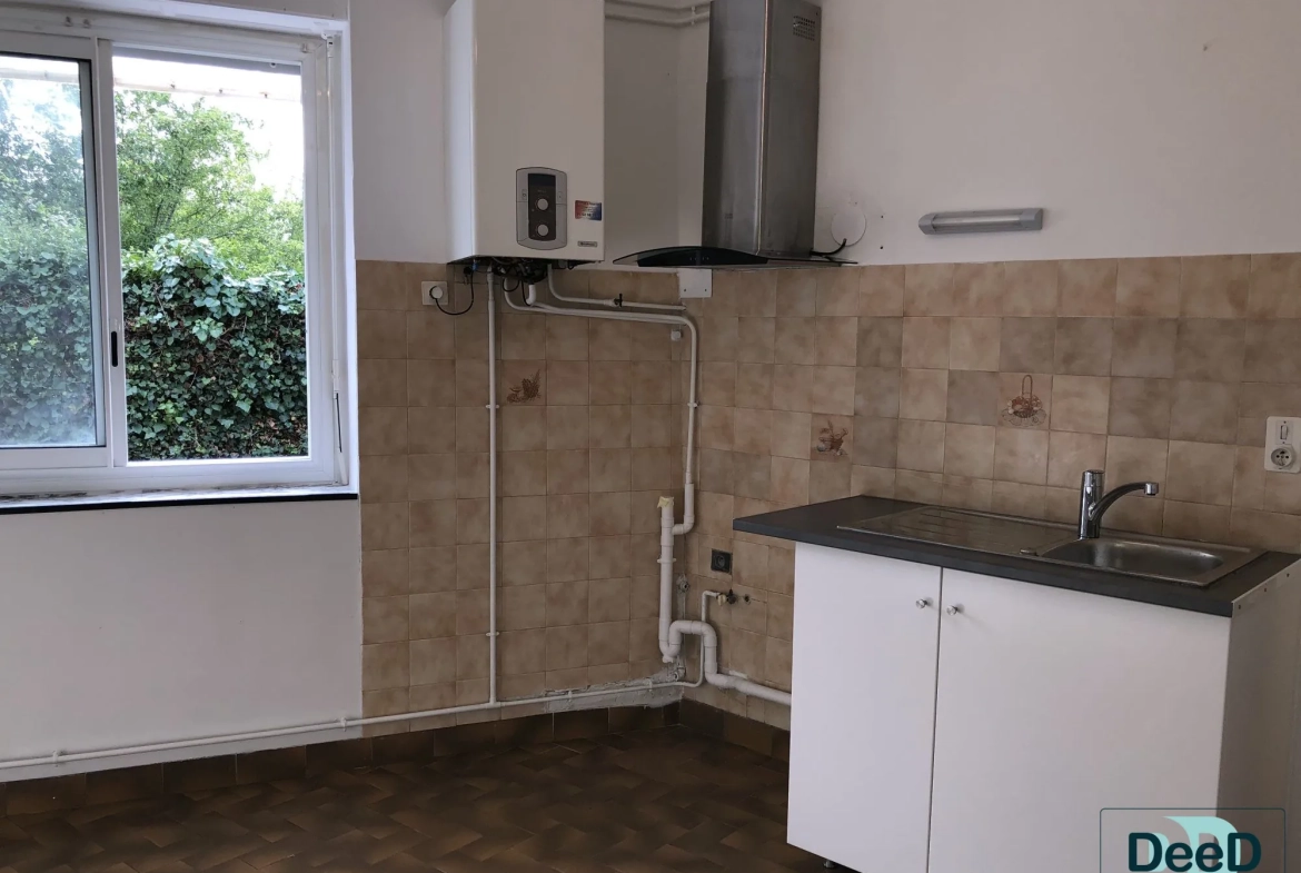 Immeuble à vendre à LANNEMEZAN avec potentiel locatif et garages 