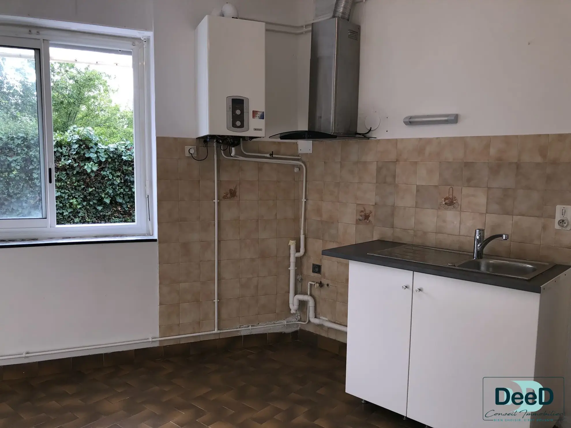 Immeuble à vendre à LANNEMEZAN avec potentiel locatif et garages 