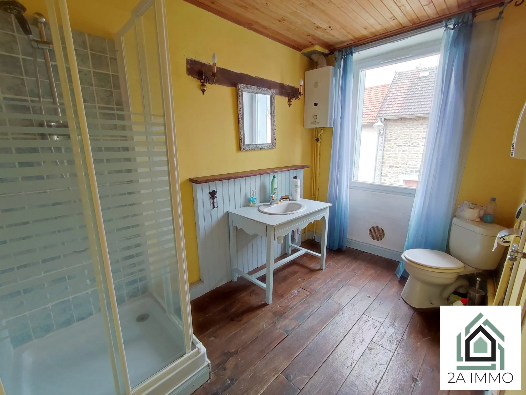 Maison de 164 m² en centre-ville aux Ancizes-Comps avec jardin et potentiel à finir 