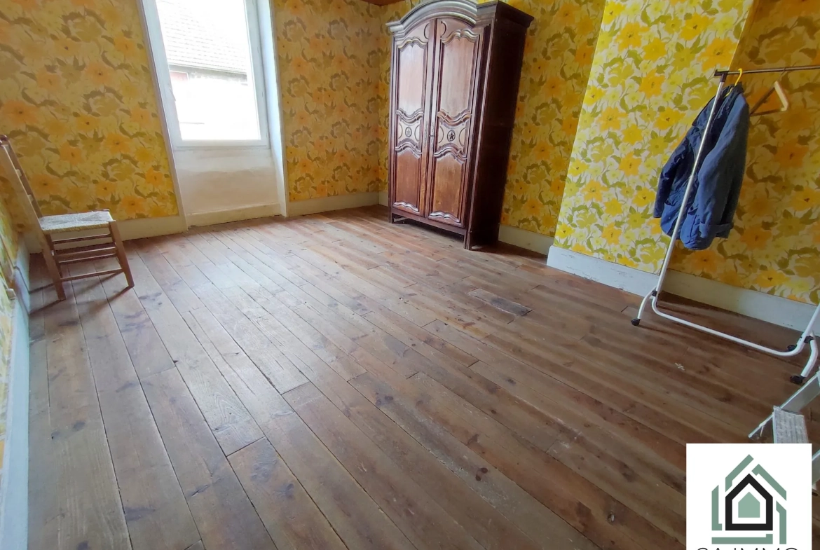 Maison de 164 m² en centre-ville aux Ancizes-Comps avec jardin et potentiel à finir 