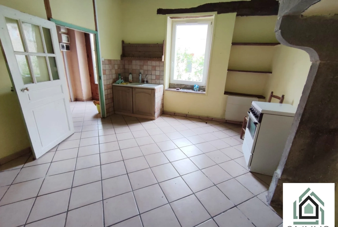 Maison de 164 m² en centre-ville aux Ancizes-Comps avec jardin et potentiel à finir 