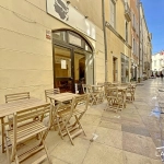 Restaurant à vendre au cœur de Nîmes avec terrasse et loyer avantageux