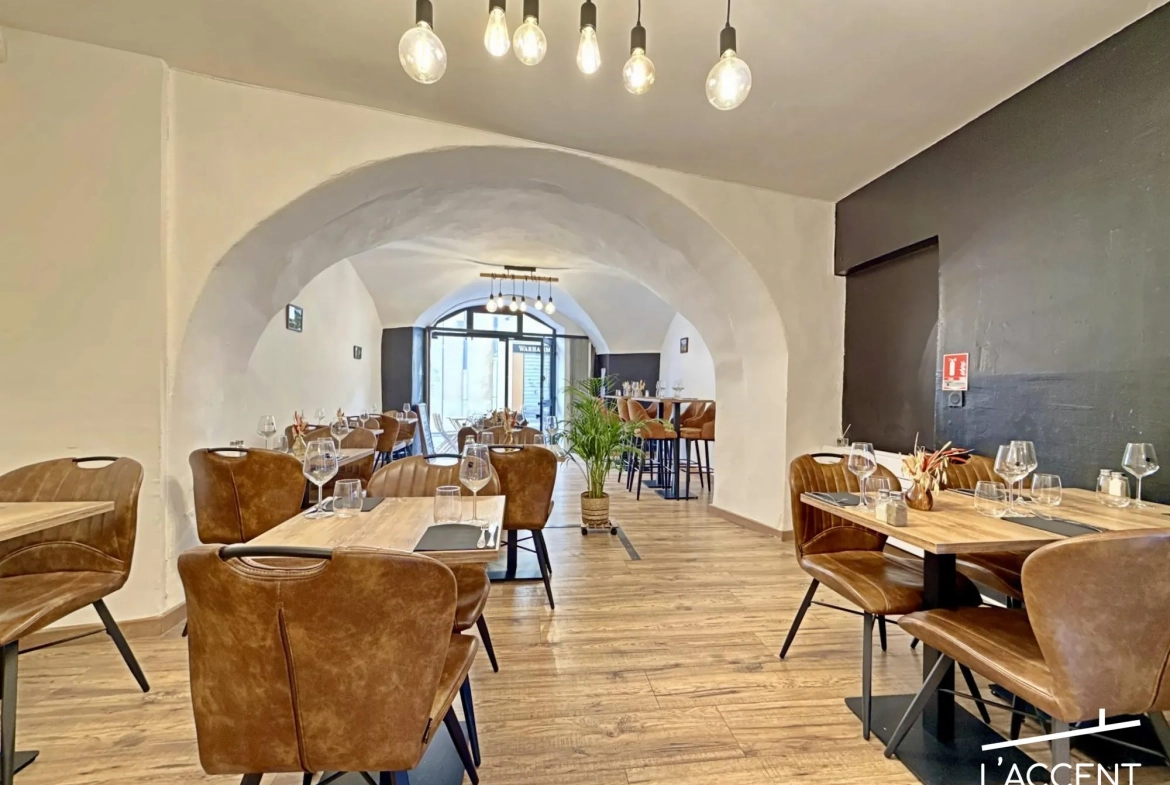 Restaurant à vendre au cœur de Nîmes avec terrasse et loyer avantageux 