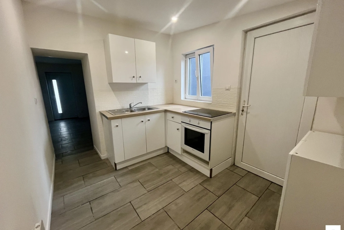 Belle maison de plain-pied à vendre à Bruay-sur-l'Escaut avec jardin et dépendances 