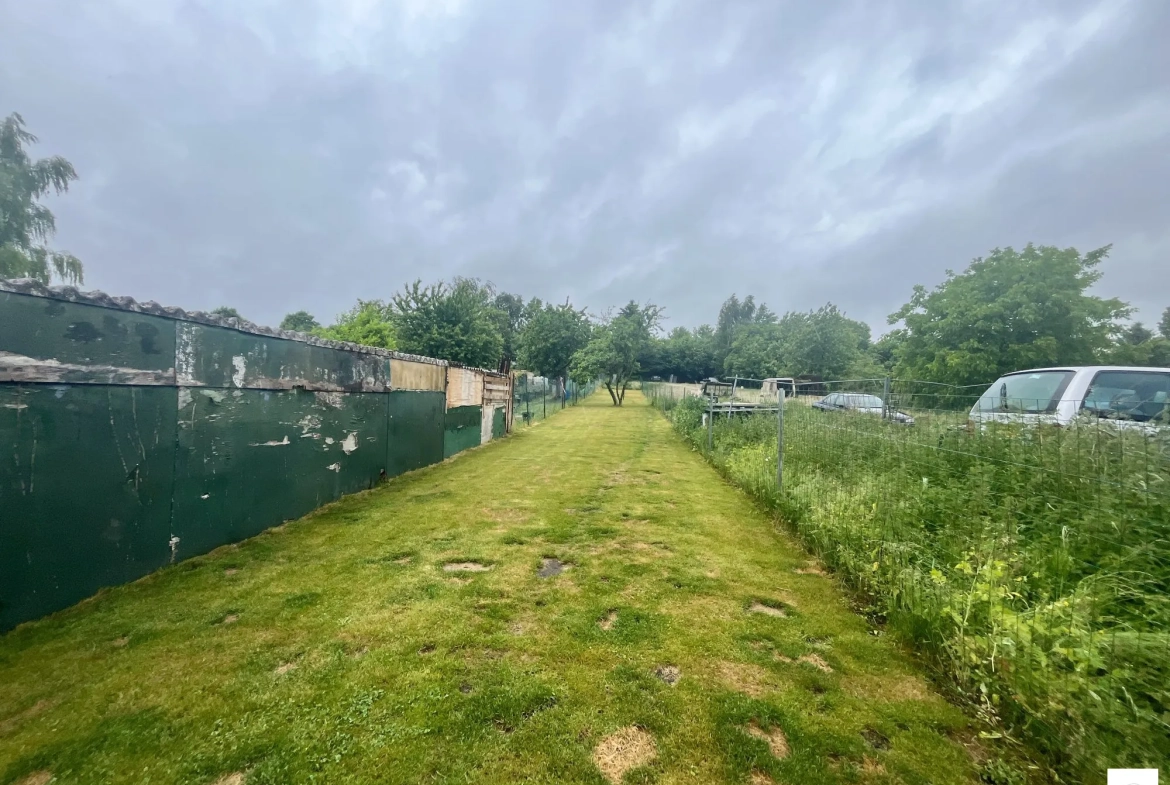 Belle maison de plain-pied à vendre à Bruay-sur-l'Escaut avec jardin et dépendances 