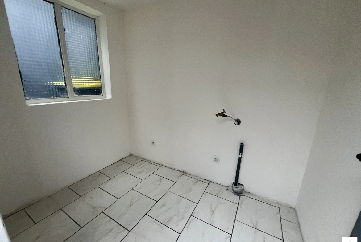 Belle maison de plain-pied à vendre à Bruay-sur-l'Escaut avec jardin et dépendances 
