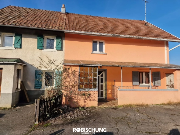 Maison mitoyenne à Tagsdorf avec 3 chambres, jardin clos et garage, proche frontière suisse