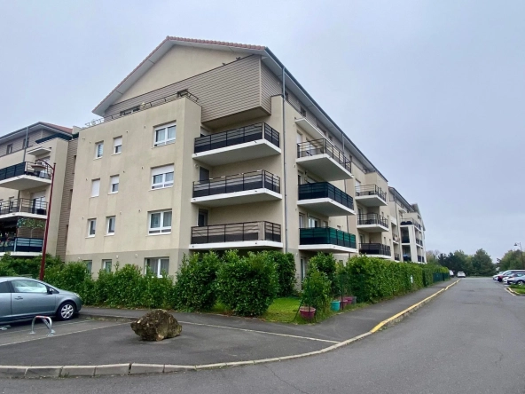 Appartement 3 pièces avec terrasse et parking à Woippy - Résidence récente
