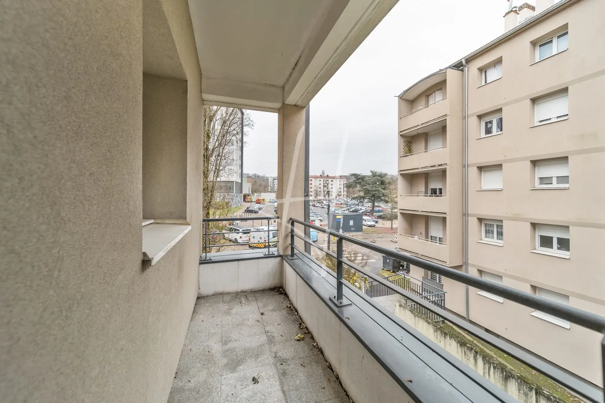 Appartement F2 à Thionville de 52,75 m² avec balcon, parking sécurisé, loué, idéal investisseur 