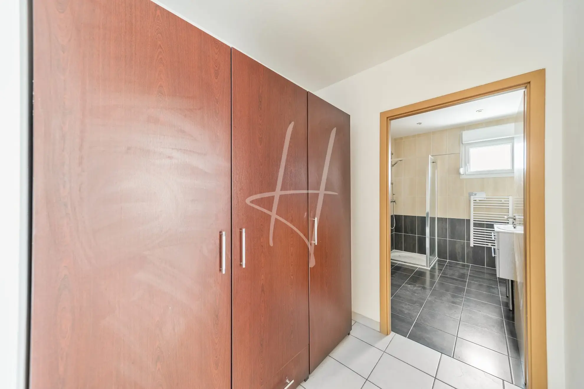 Appartement F2 à Thionville de 52,75 m² avec balcon, parking sécurisé, loué, idéal investisseur 
