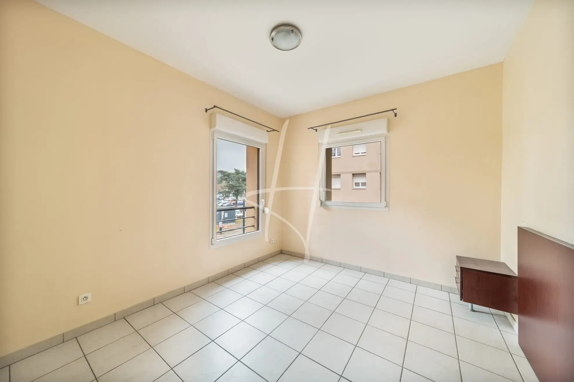 Appartement F2 à Thionville de 52,75 m² avec balcon, parking sécurisé, loué, idéal investisseur 