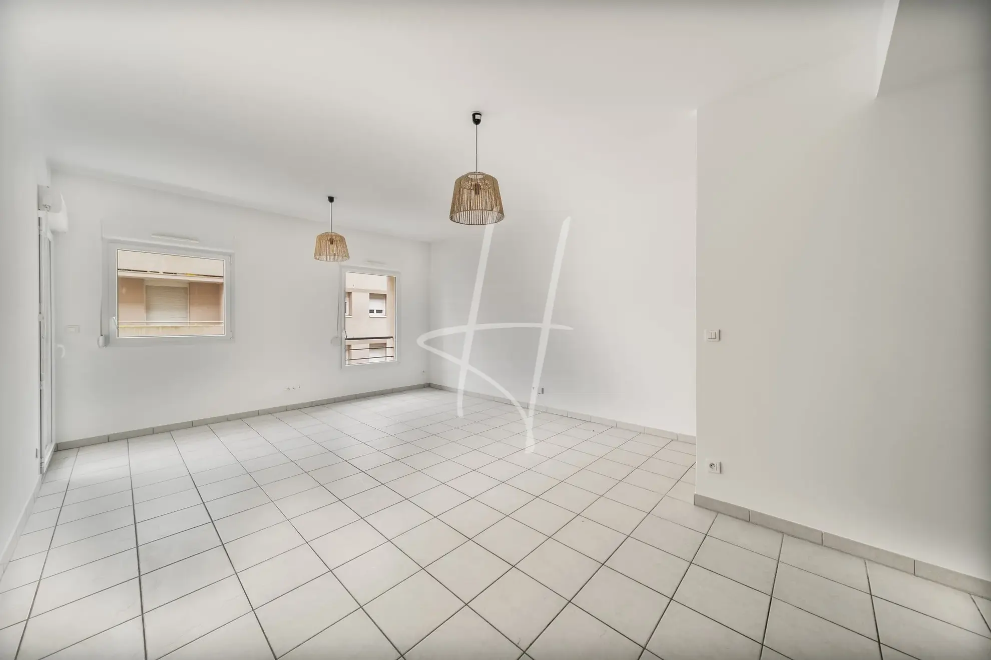 Appartement F2 à Thionville de 52,75 m² avec balcon, parking sécurisé, loué, idéal investisseur 
