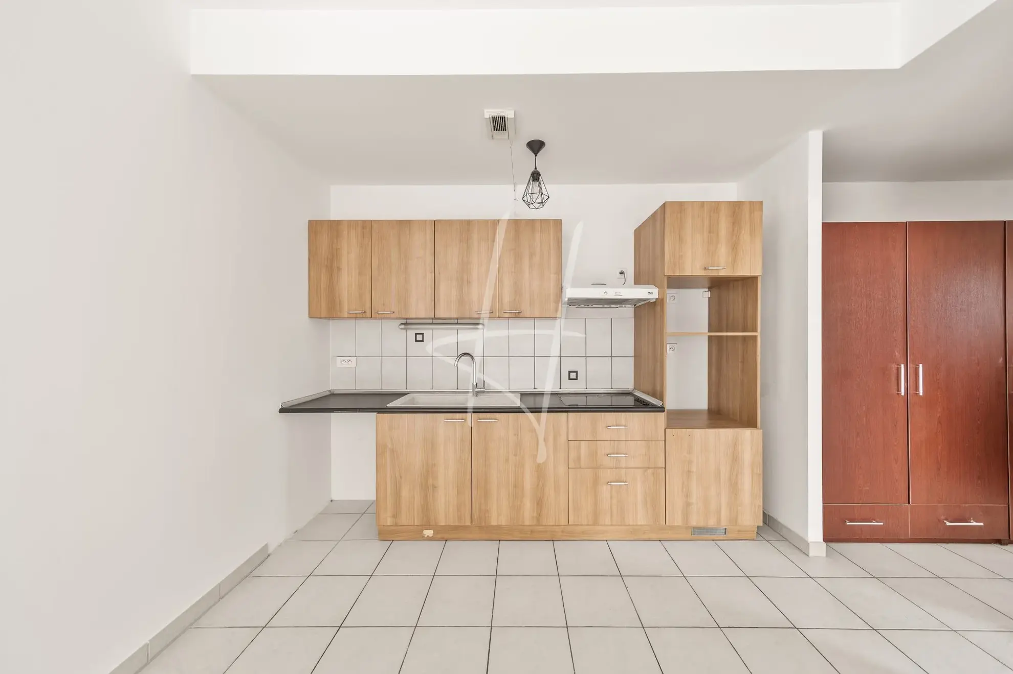 Appartement F2 à Thionville de 52,75 m² avec balcon, parking sécurisé, loué, idéal investisseur 