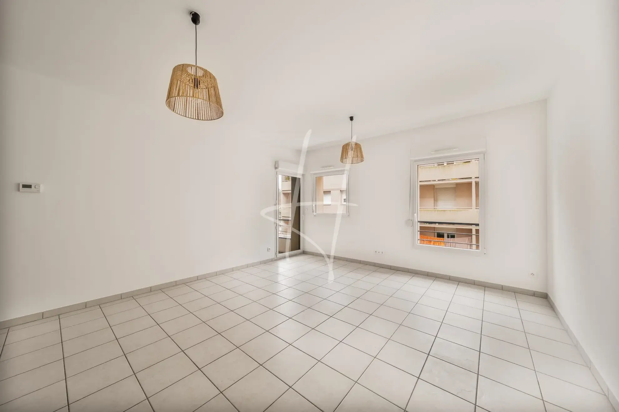 Appartement F2 à Thionville de 52,75 m² avec balcon, parking sécurisé, loué, idéal investisseur 