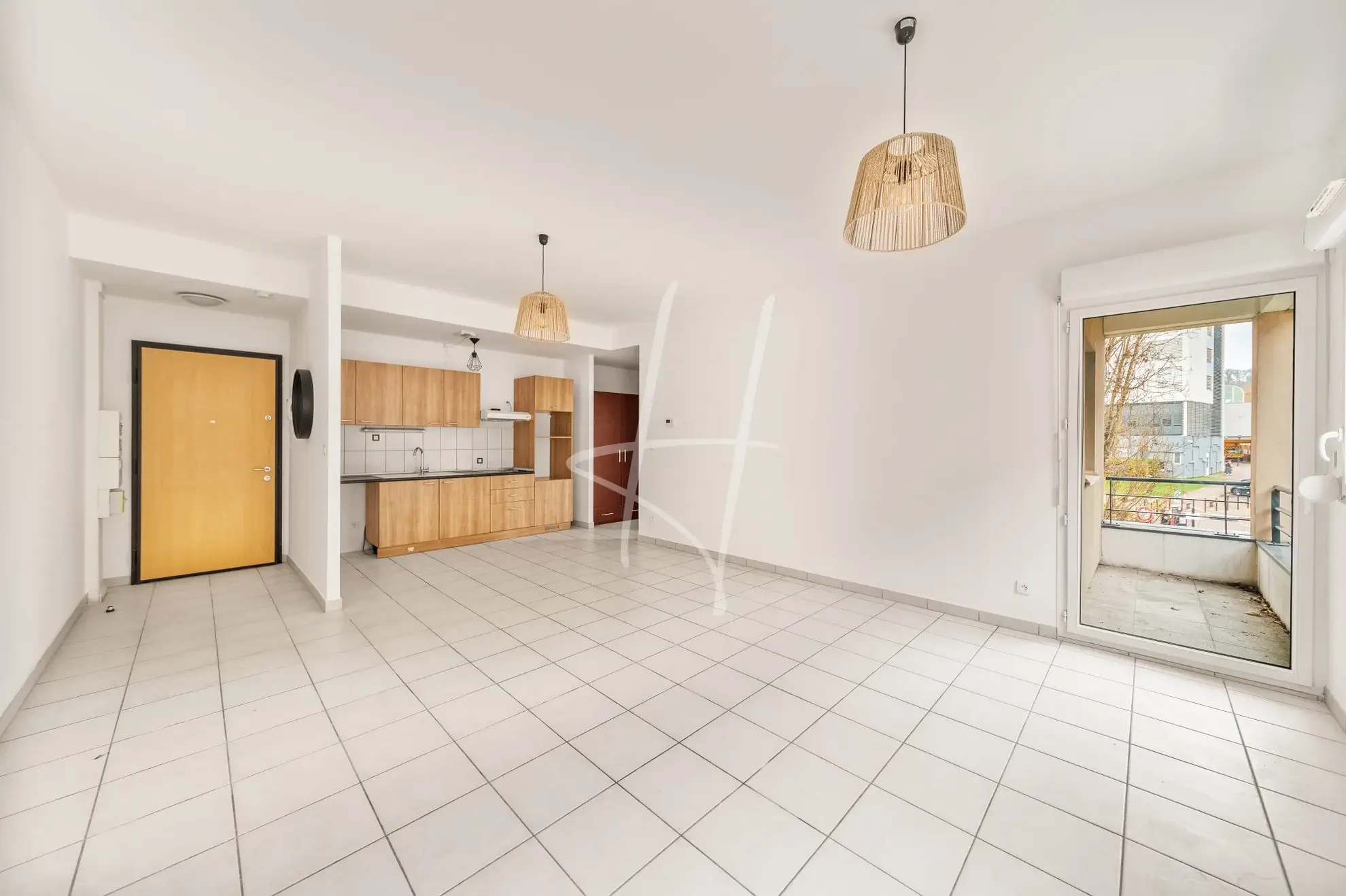 Appartement F2 à Thionville de 52,75 m² avec balcon, parking sécurisé, loué, idéal investisseur 
