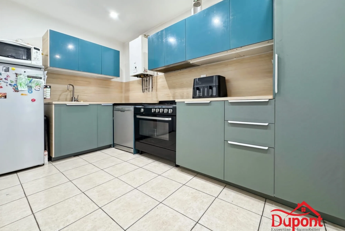 Maison mitoyenne à Caudry de 130 m² avec jardin et 3 chambres 