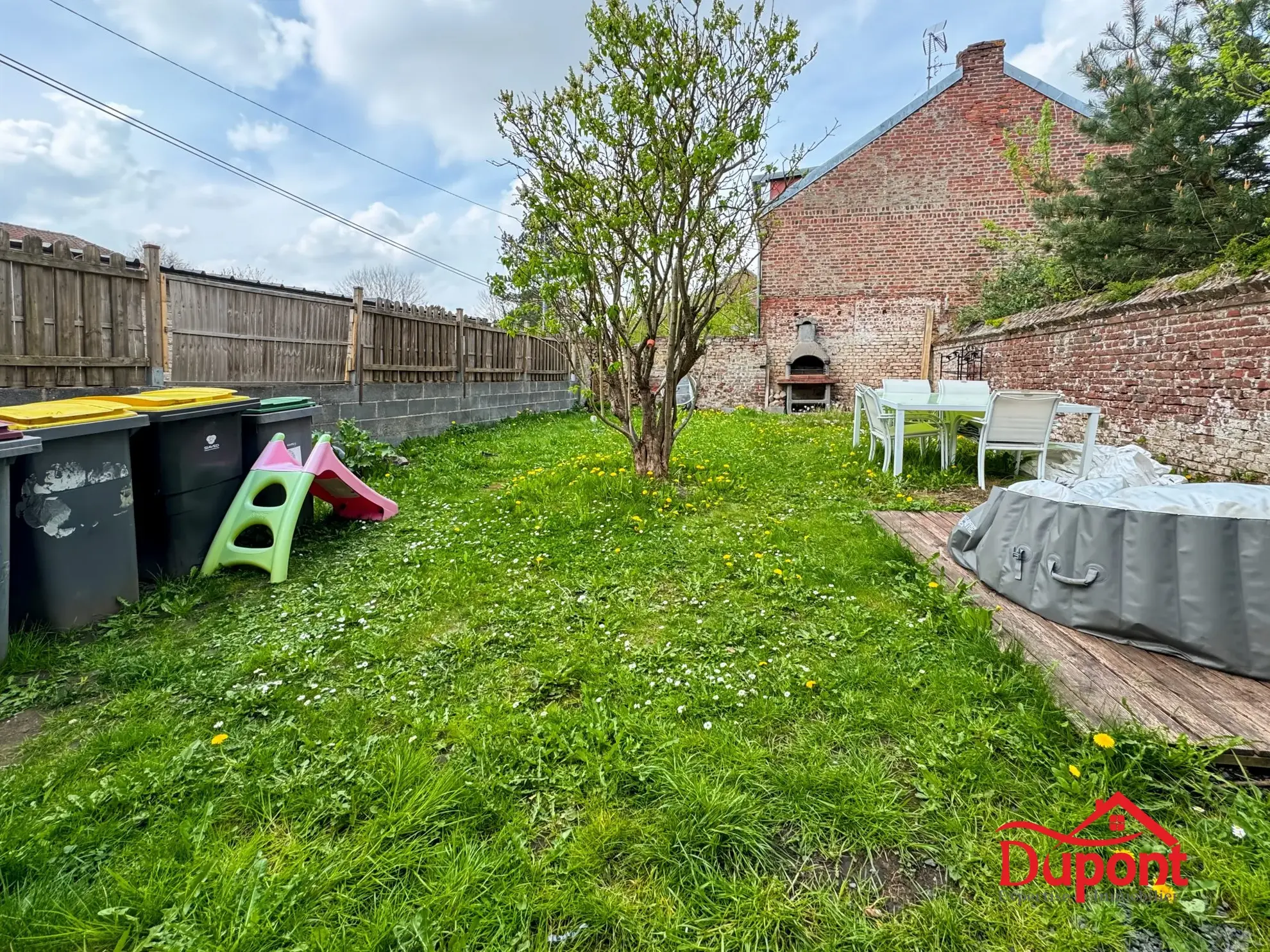 Maison mitoyenne à Caudry de 130 m² avec jardin et 3 chambres 