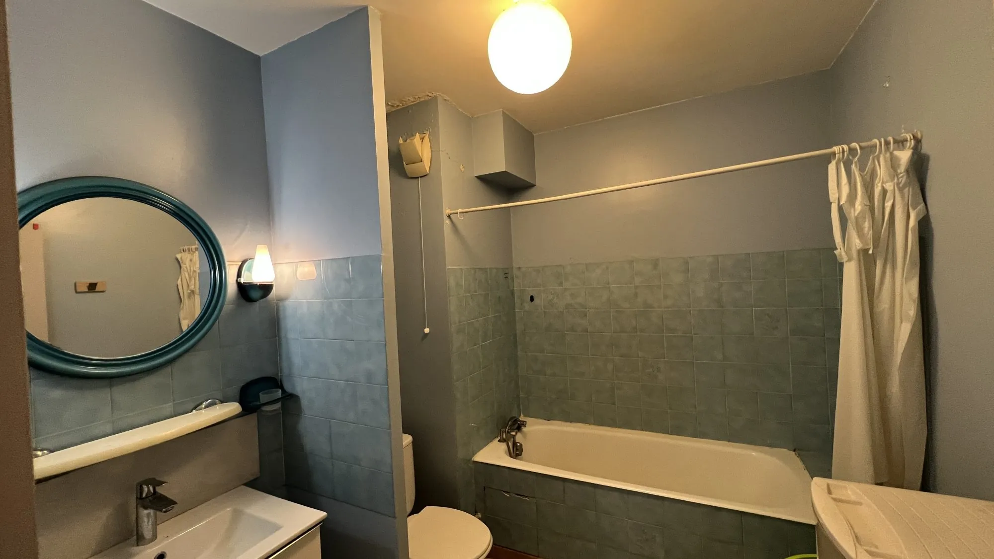 Appartement T1 en rez-de-jardin à Grenoble avec stationnement et cave 