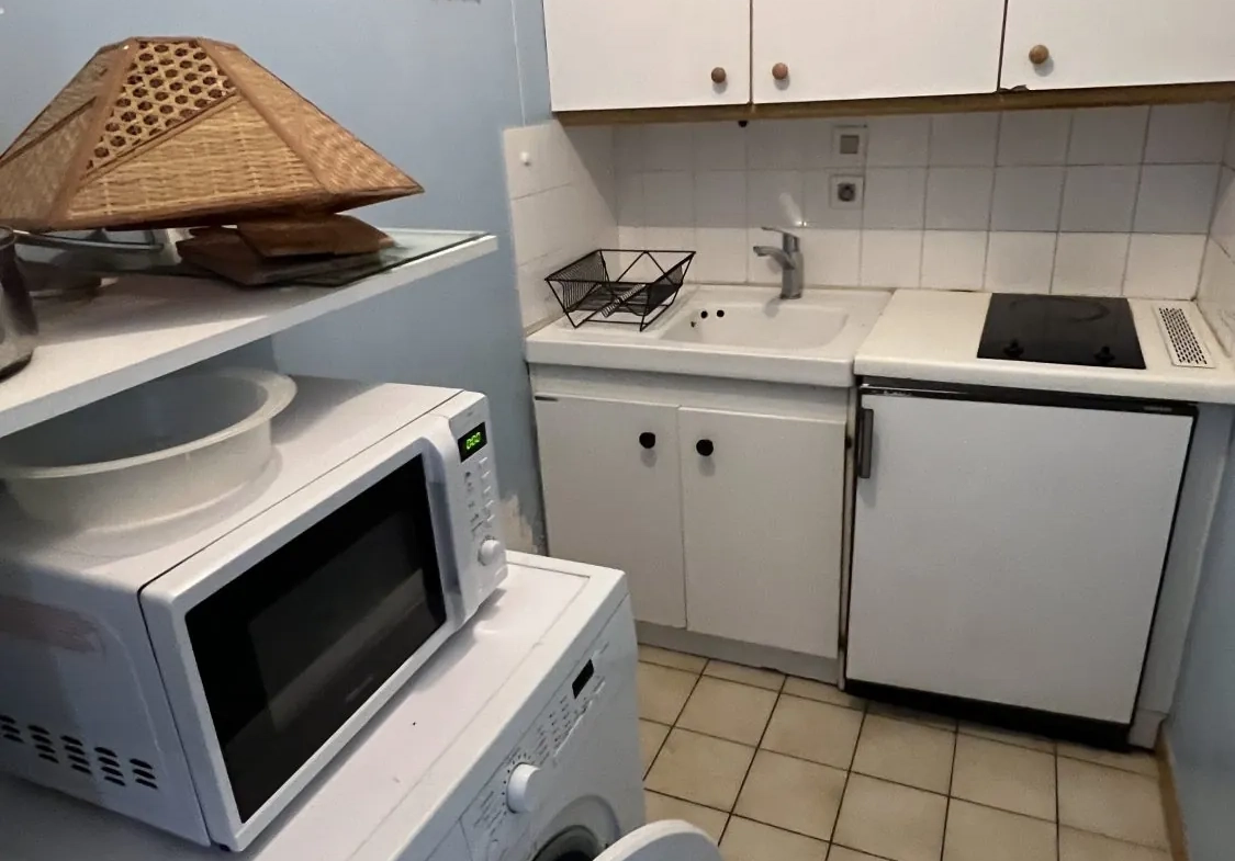 Appartement T1 en rez-de-jardin à Grenoble avec stationnement et cave 