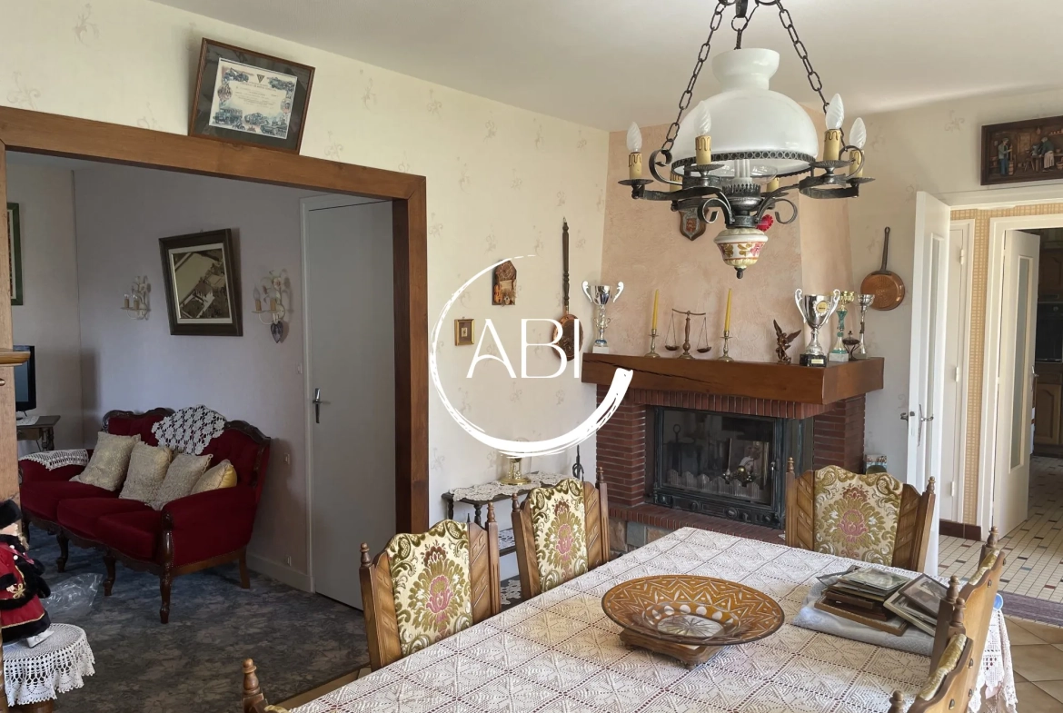 Maison à Rives d'Andaine de 73 m² avec terrain de 5074 m² et double garage 