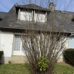 Maison mitoyenne à rénover à Lisieux – 95 m² avec 4 chambres et garage