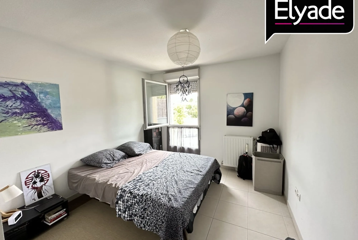 Appartement T2 à vendre à Escalquens, vue verte, parking privé et bail en cours 