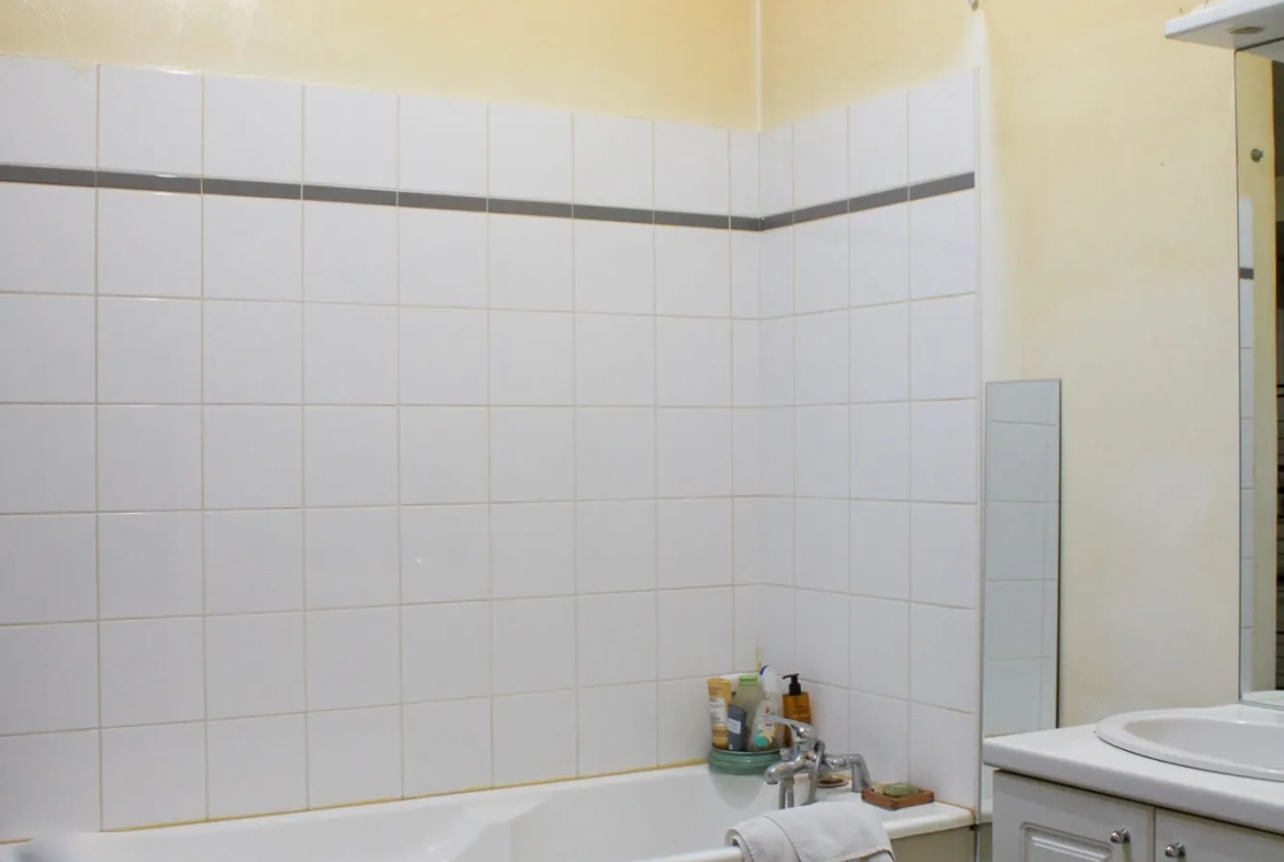 Vente d'un appartement T4 de 85 m² à Rouen rue Beauvoisine - Résidence récente 