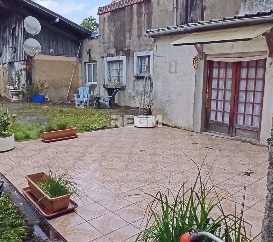 Maison de 136 m² à Bourges avec potentiel d'aménagement et environnement idéal 