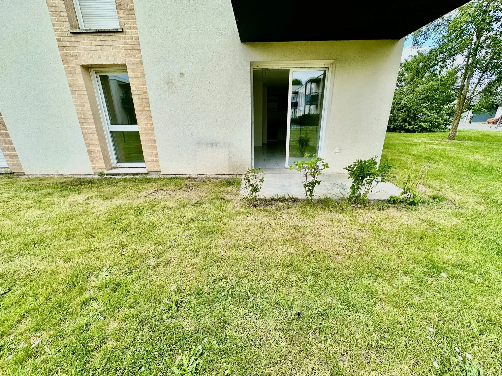 persepective extérieur Appartement T2 récent avec terrasse, stationnement et proximité écoles à Douai 