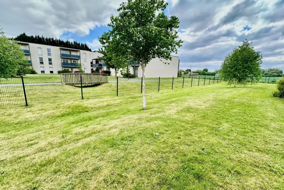 autre vue espaces verts aucun passage au quotidien Appartement T2 récent avec terrasse, stationnement et proximité écoles à Douai 