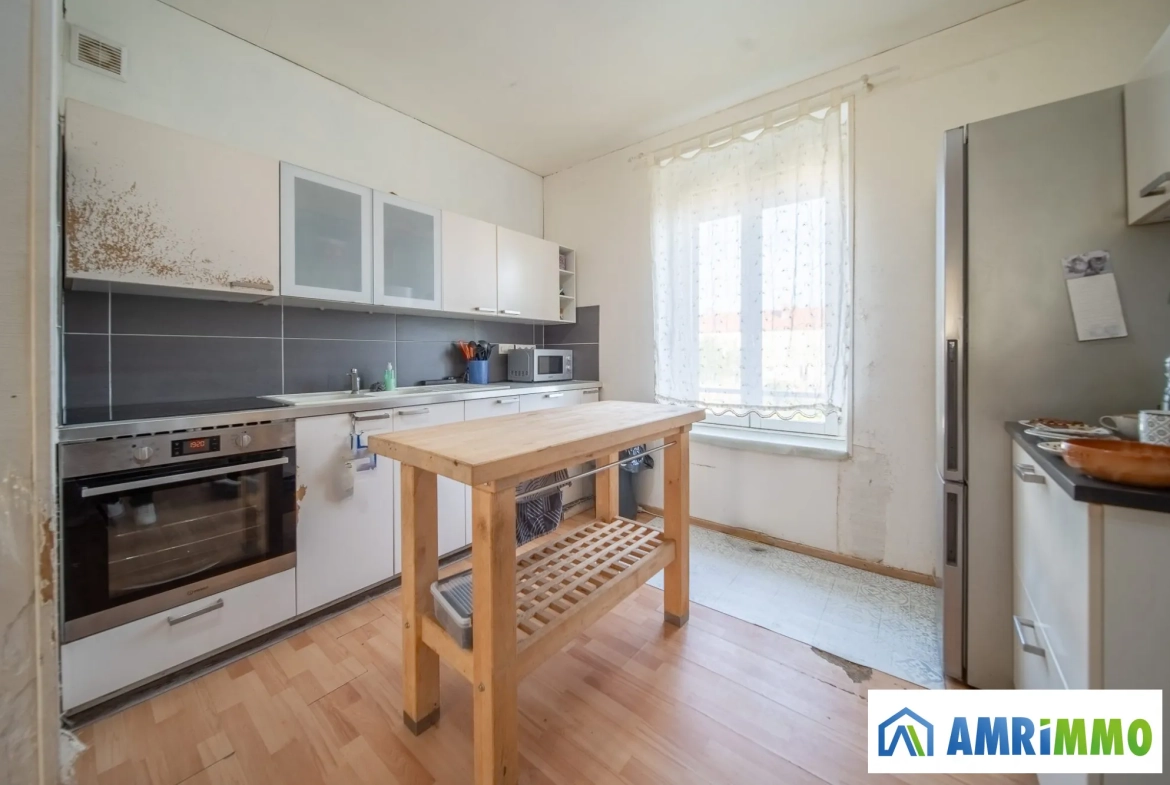 Maison à vendre à Piennes avec jardin, 2 chambres et cave - Opportunité à saisir 