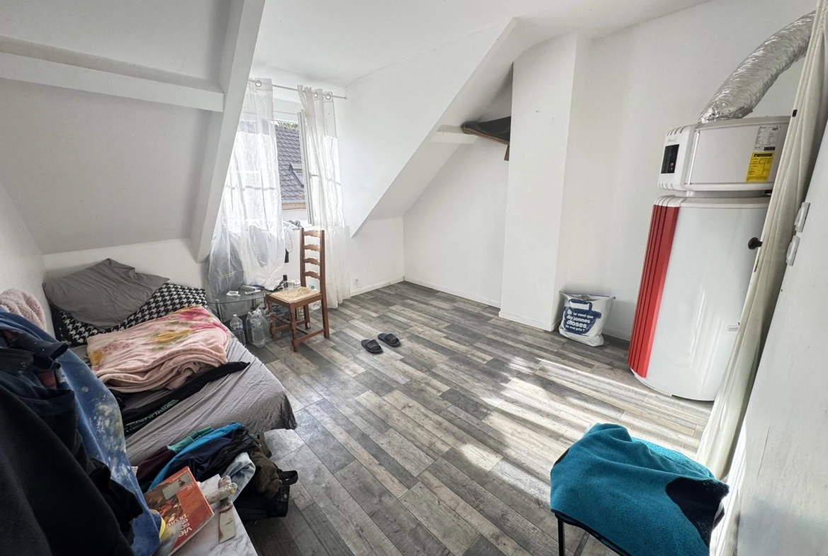 Immeuble rénové avec triplex, F2 neuf et loué au centre-ville de Montluçon 