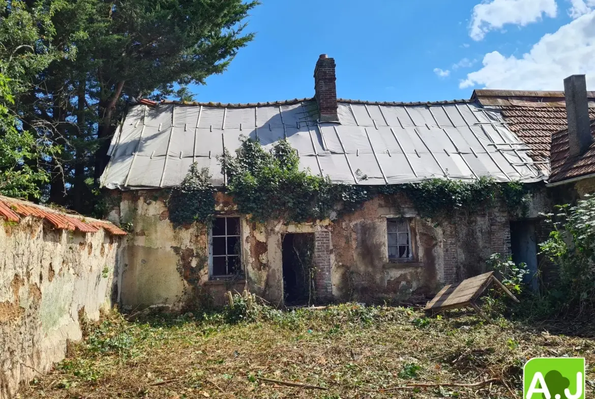 Maison à restaurer au centre-ville de Saint-André-de-l'Eure avec potentiel et terrain clos 