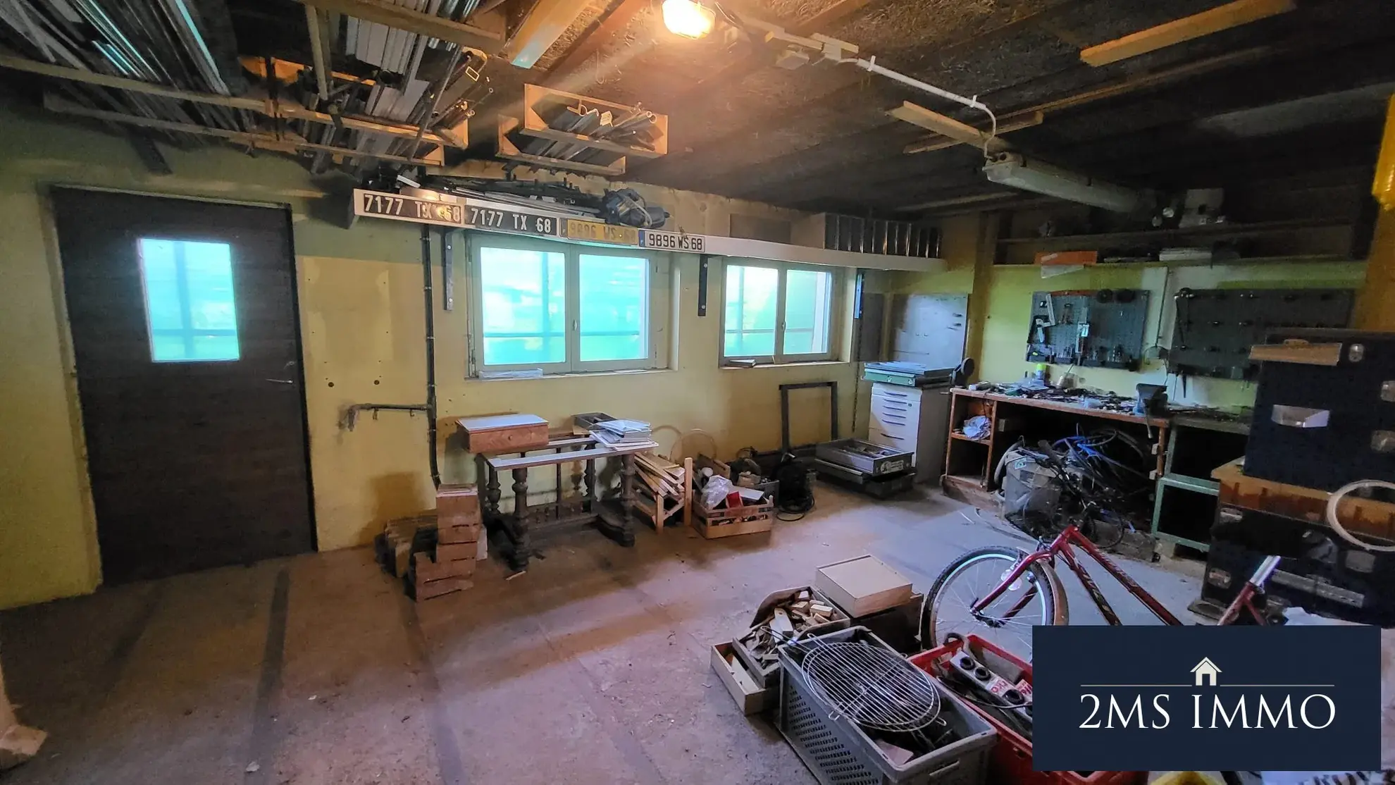Grande dépendance à Ungersheim de 182 m² à aménager avec parking extérieur 