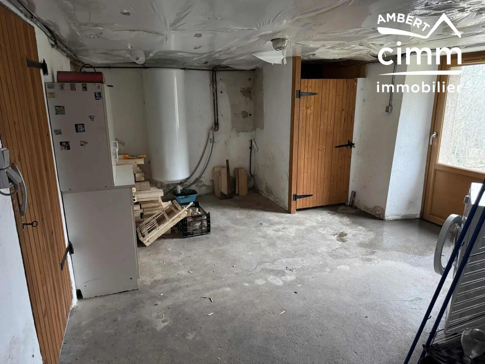 Achat ensemble de deux maisons mitoyennes à Ambert avec garages et jardin, idéal investisseur 
